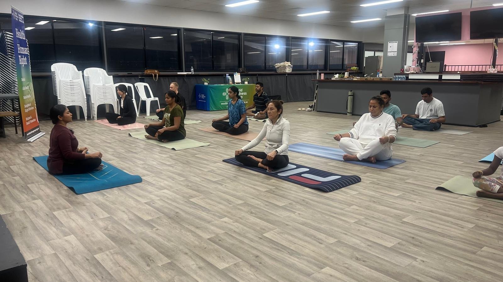 Community members connecting after Breathe and Connect